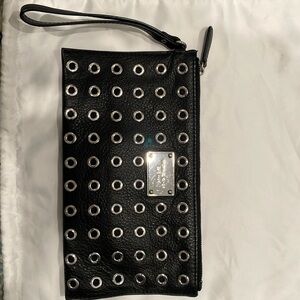 Michael Kors black leather clutch wristlet with silver grommets